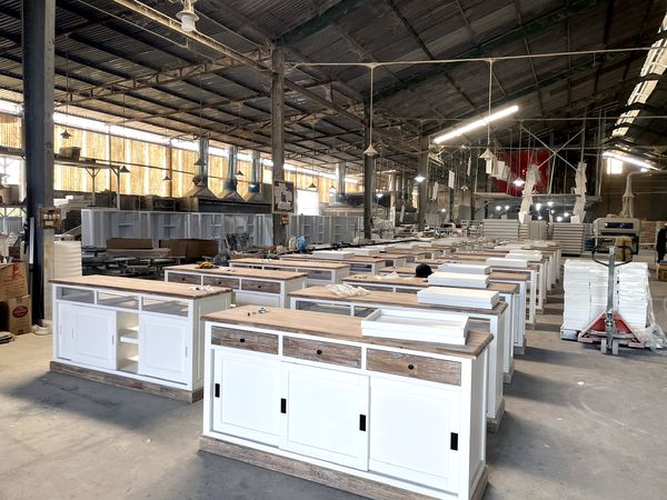 Production hall with sideboards in final assembly at Tan Phuoc Furniture