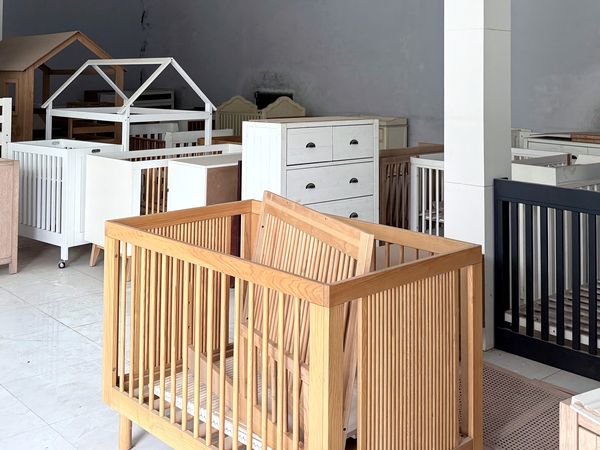 Showroom samples: solid-wood cribs, dressers and house beds