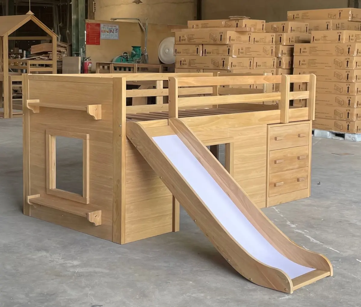 Wooden children's bed with slide