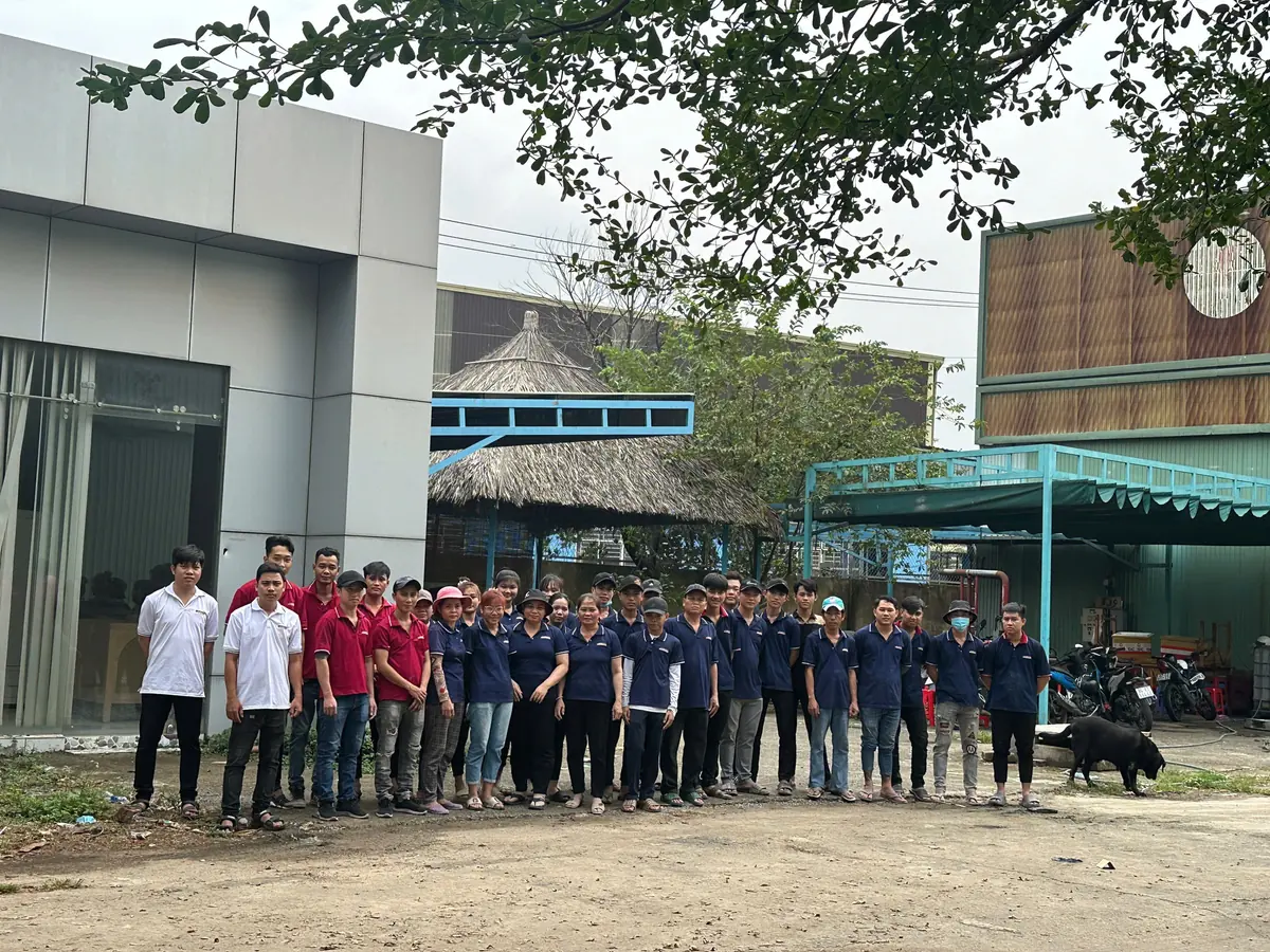 Tan Phuoc team outside the factory